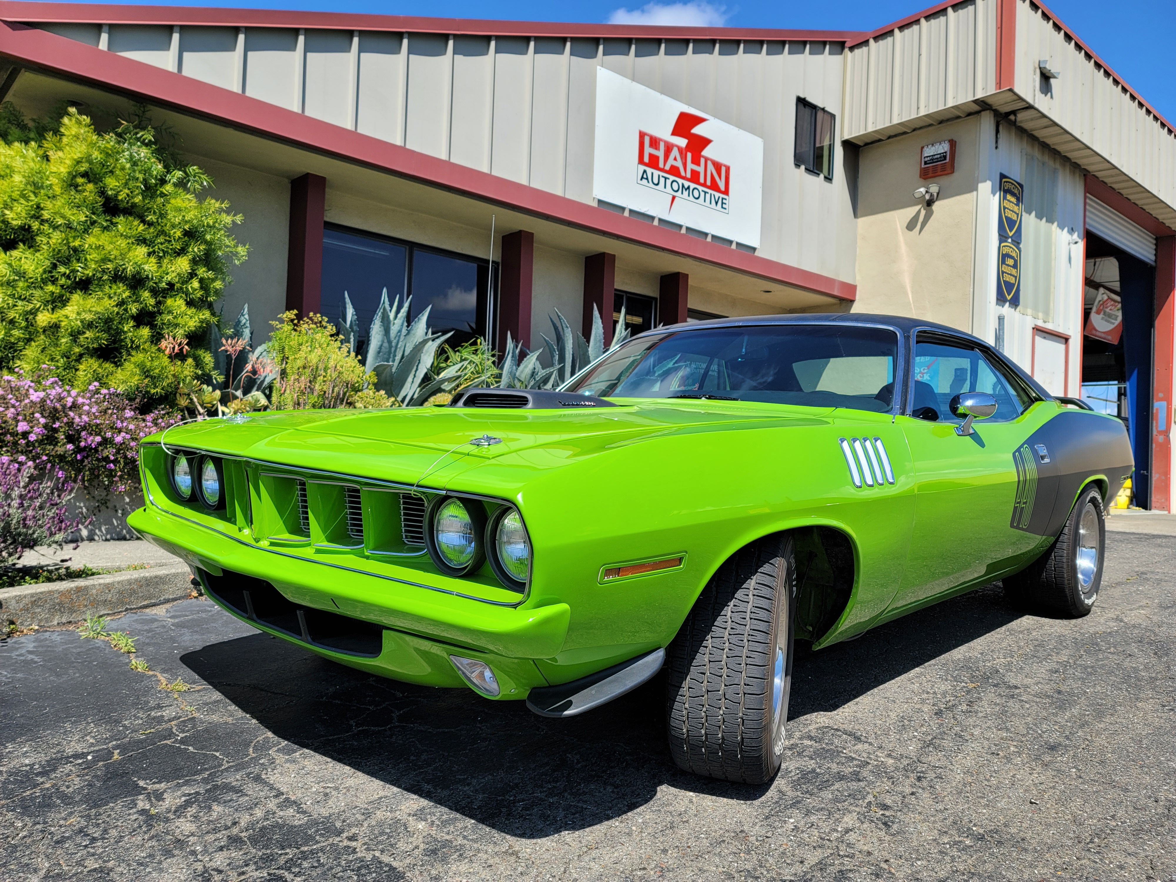 Hahn Automotive Santa Rosa shop exterior with classic Barracuda